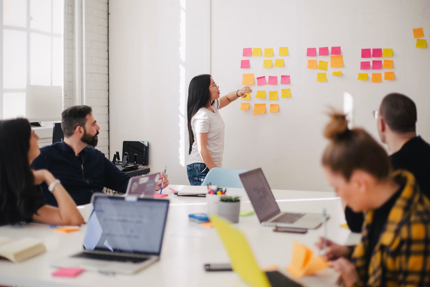 Professionals collaborating in a modern workplace